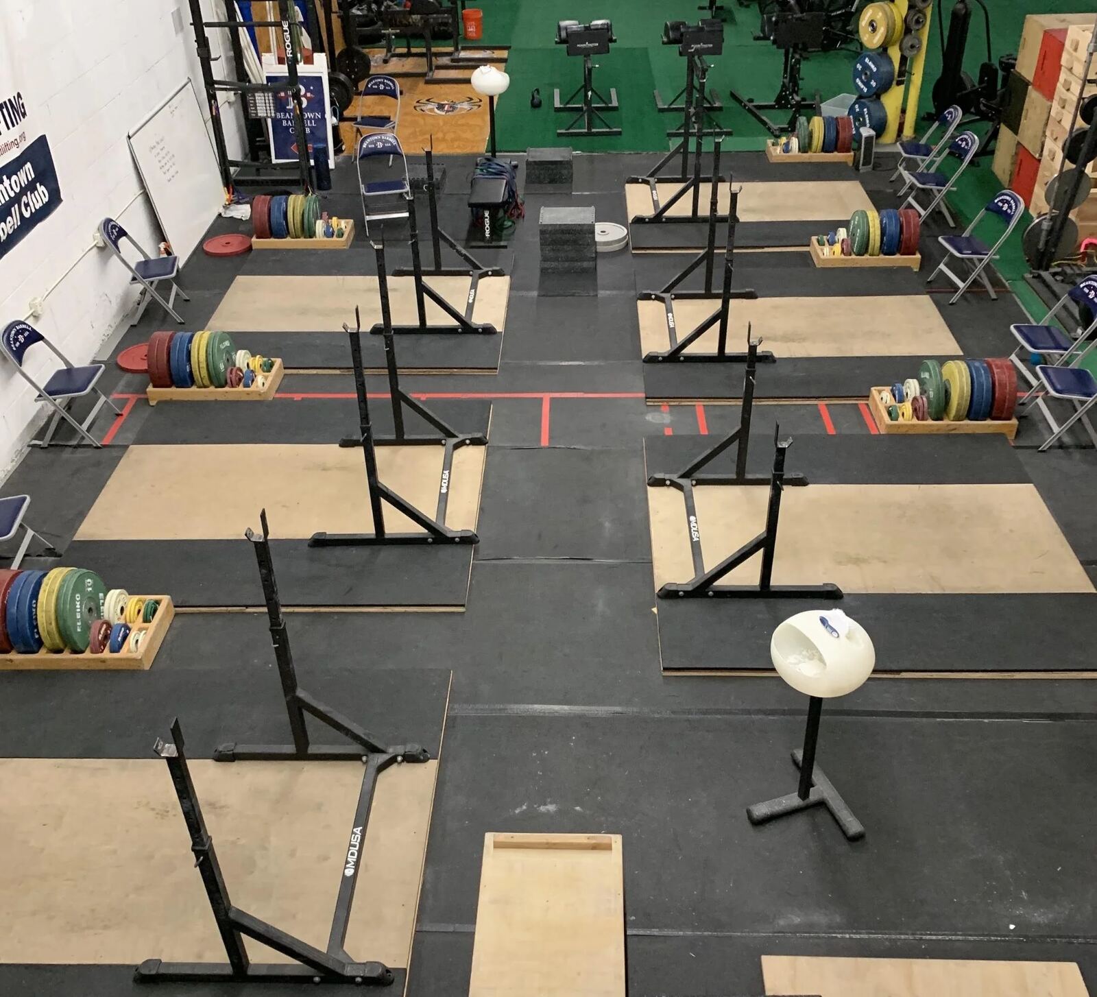 Weightlifting equipment and platforms at Beantown Barbell Club
